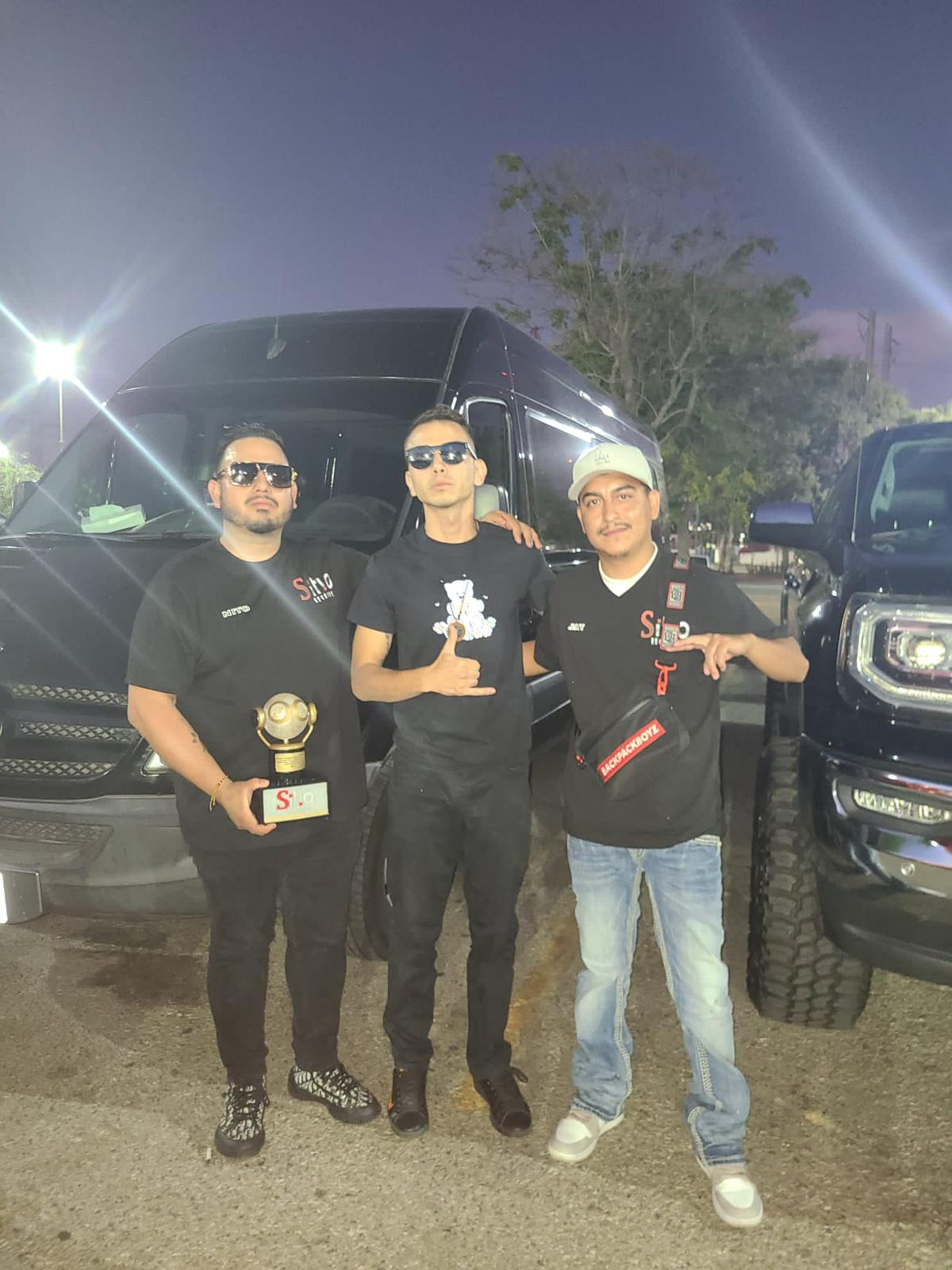 TOTA Art Gallery clients with custom sculpture award